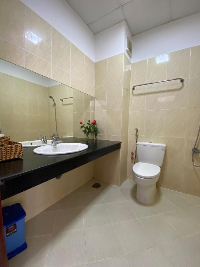 Con Dao Guesthouse Chi Khu Co Ong Buitenkant foto
