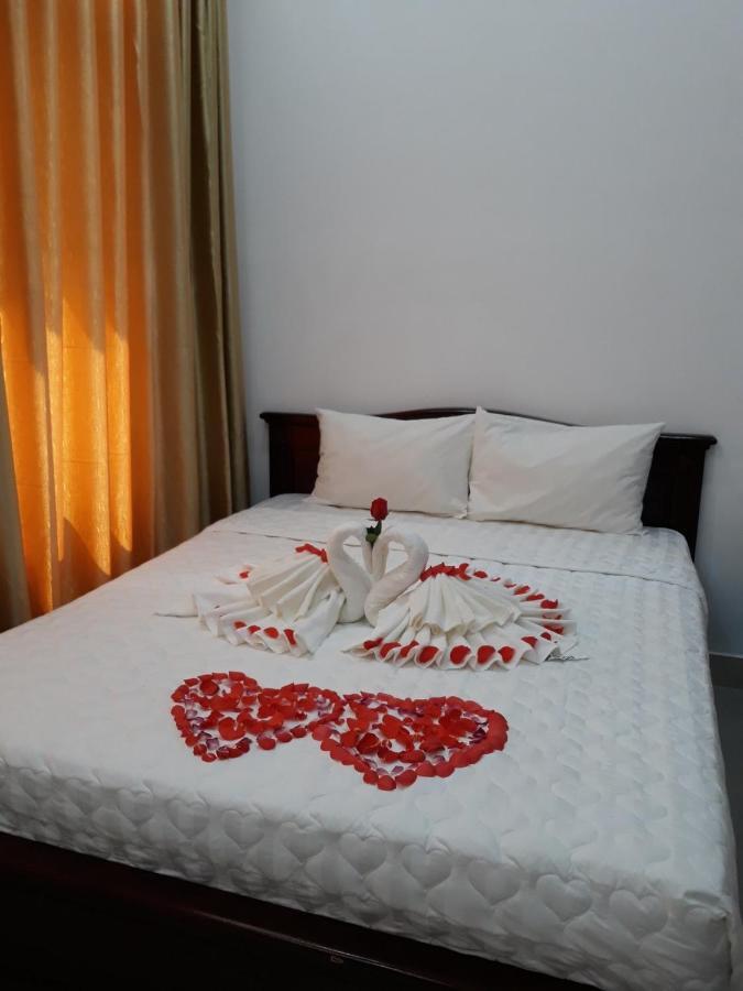 Con Dao Guesthouse Chi Khu Co Ong Buitenkant foto